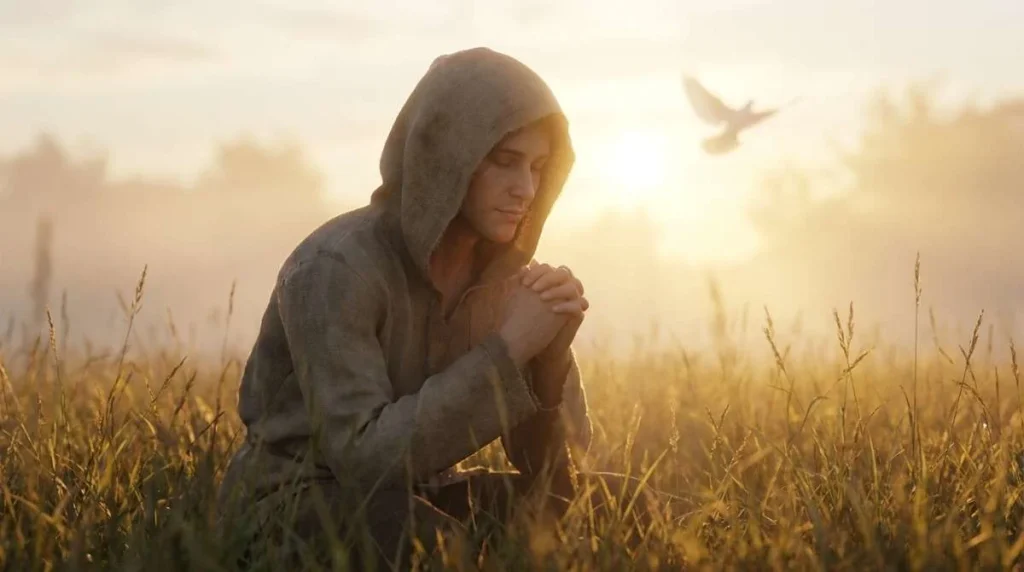 A gentle scene of a person in prayer for the restoration and healing of family relationships.